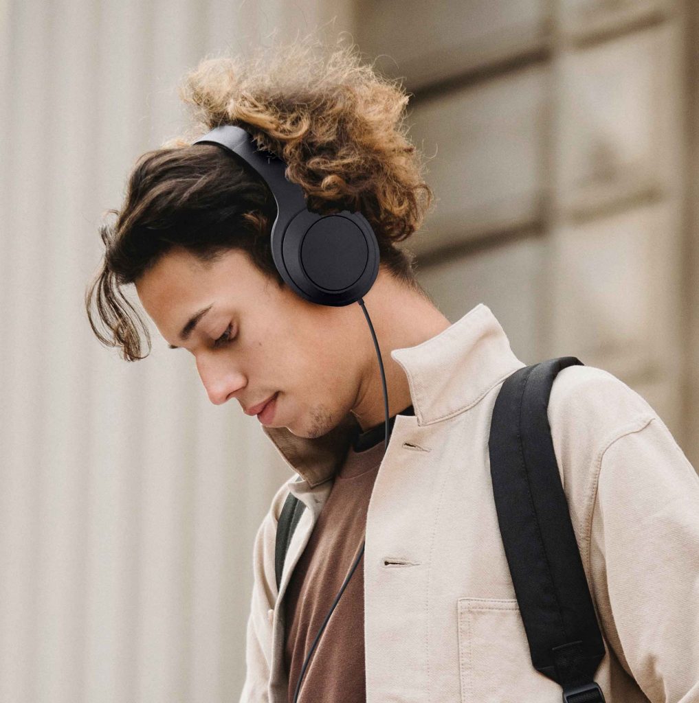 young man wearing usb-c headphones by sentry